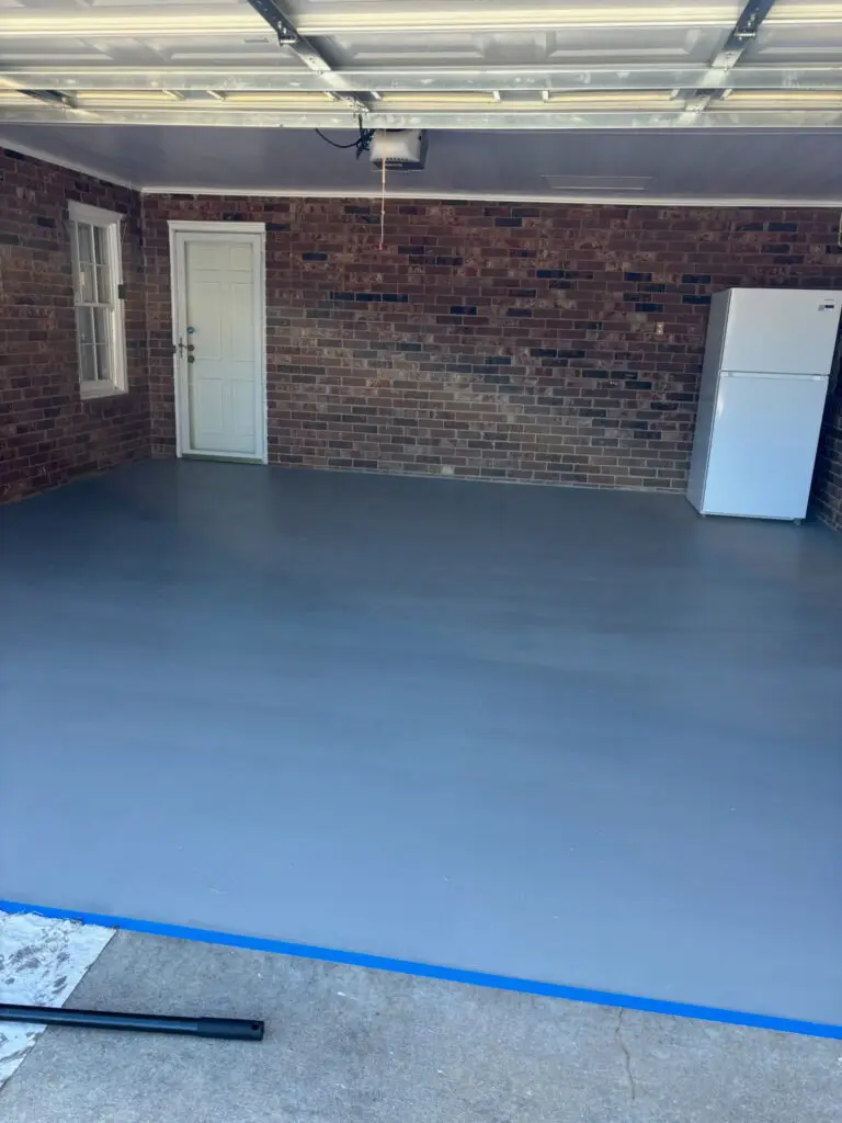 Garage Floor Painting & Ceiling Panel Installation in Greenville — garage renovation