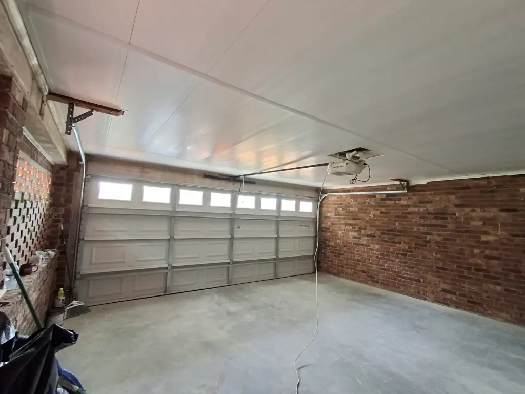 Garage Floor Painting & Ceiling Panel Installation in Greenville — greenville handyman
